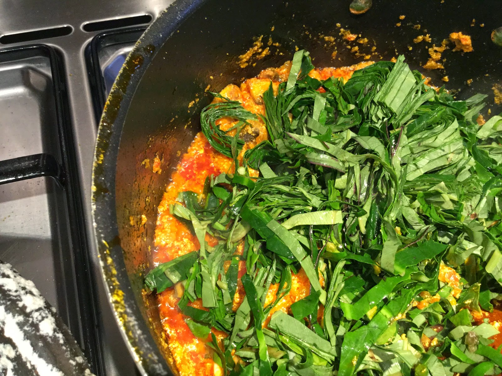 A healthy Ghanaian dish for fitness lovers: Garlic buttered seafood kontomire